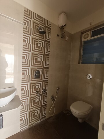 Bathroom in 1 BHK Apartment at Strawberry The Address, Mira Road East – for Rent