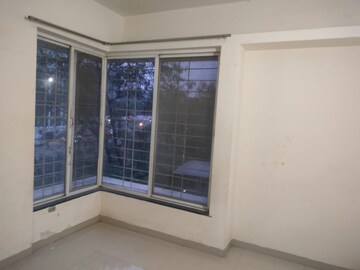 Room in 2 BHK Apartment at Nirman Silver Mist, Lohgaon – for Rent