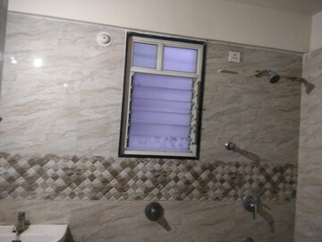 Attached Bathroom in 2 BHK Apartment at Nirman Silver Mist, Lohgaon – for Rent