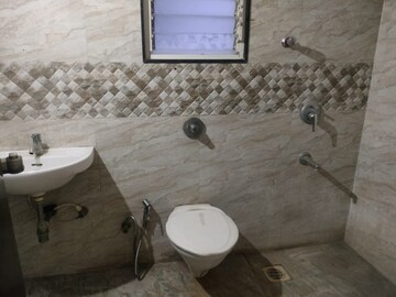 Bathroom in 2 BHK Apartment at Nirman Silver Mist, Lohgaon – for Rent