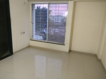 Room in 2 BHK Apartment at Nirman Silver Mist, Lohgaon – for Rent