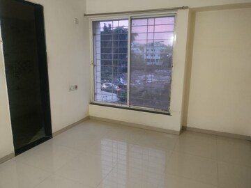 Room in 2 BHK Apartment at Nirman Silver Mist, Lohgaon – for Rent