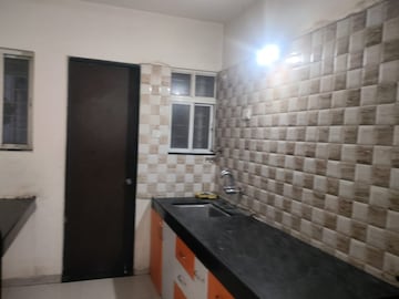 Kitchen in 2 BHK Apartment at Nirman Silver Mist, Lohgaon – for Rent