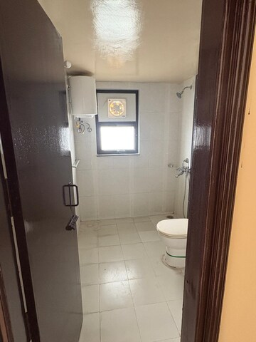 Bathroom in 3 BHK Apartment at AWHO Twin Towers PH4, Omega I Greater Noida – for Rent