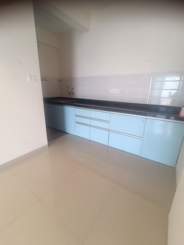Kitchen in 2 BHK Apartment at Panama Silver Stone, Handewadi – for Rent