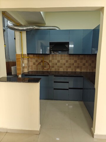 Kitchen in 2 BHK Apartment at JKG Palm Court, Sector 16c Greater Noida – for Rent