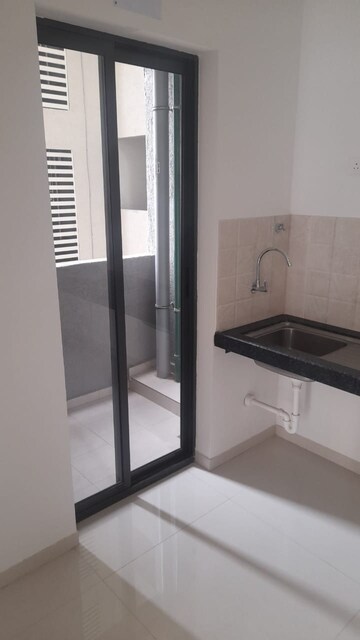 Staircase in 2 BHK Apartment at Shapoorji Pallonji Sensorium, Hinjewadi – for Rent