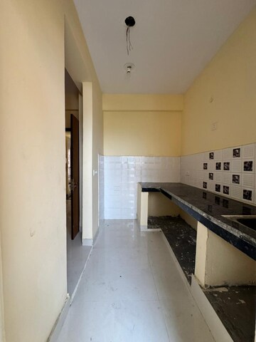 Kitchen in 1 BHK Apartment at Eureka Diya Green City, Raj Nagar Extension – for Sale
