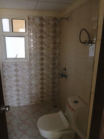 Bathroom in 1 BHK Apartment at Eureka Diya Green City, Raj Nagar Extension – for Sale