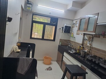 Kitchen in 2 BHK Apartment at Lok Upvan Apartment Phase 2, Vasant Vihar – for Rent