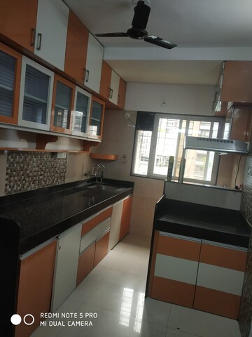 Kitchen in 2 BHK Apartment at G K Roseland Residency, Pimple Saudagar – for Rent