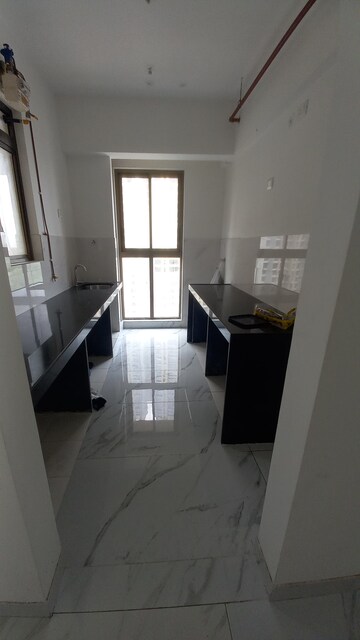 Kitchen in 2 BHK Apartment at Raymond The Address, Pokhran Road No Two – for Rent