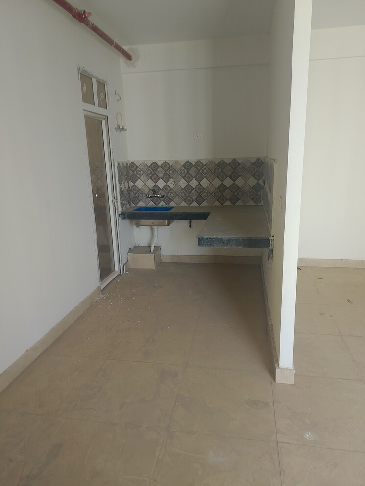 Kitchen, signature-global-golf-greens 3 Bedroom 740 Sq.Ft. Apartment In Sector 79 Gurgaon 8915635