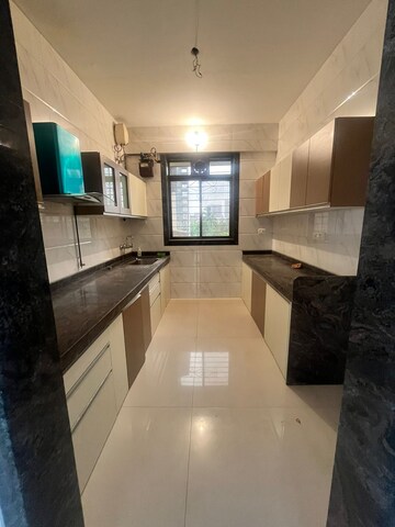 Kitchen in 3 BHK Apartment at Safal Nav Parmanu CHS, Chembur – for Rent