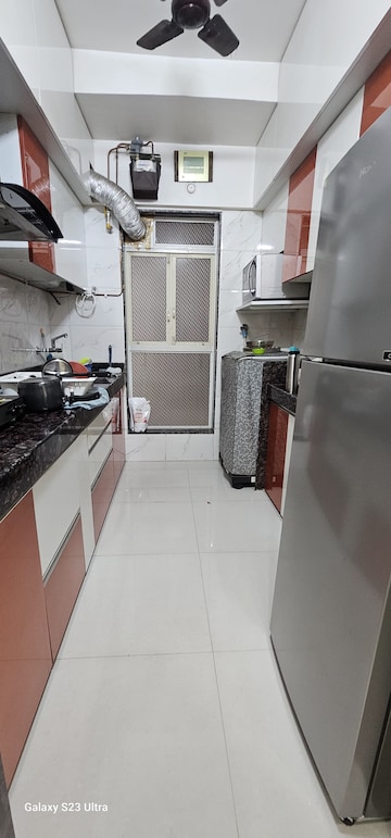 Kitchen in 1 BHK Apartment at Dharti Presidio, Malad West – for Sale