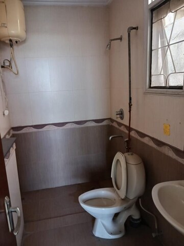 Bathroom in 3 BHK Apartment at Parsvnath Green Ville, Sector 48 – for Rent