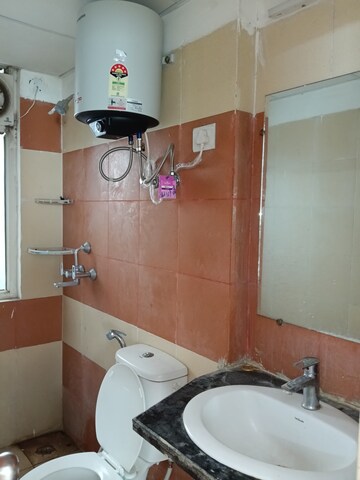 Bathroom in 3 BHK Apartment at Mahagun Mywoods, Sector 16c Greater Noida – for Rent