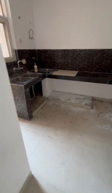 Kitchen in 2 BHK Apartment at Paramount Symphony, Sain Vihar – for Sale