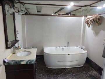 Bathroom in 1 BHK Apartment at Brigade Gateway, Rajaji Nagar – for Rent