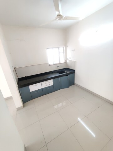 Kitchen in 2 BHK Apartment at Karan Rhea, Wadegaon – for Rent