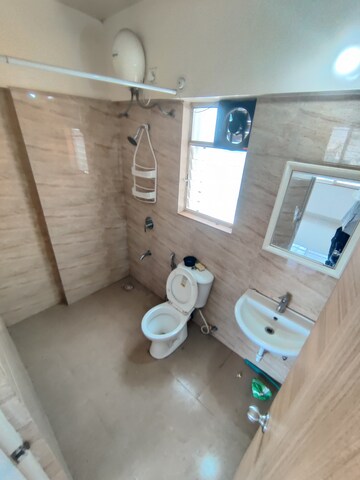 Bathroom in 2 BHK Apartment at Karan Rhea, Wadegaon – for Rent