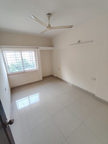 Bedroom in 2 BHK Apartment at Karan Rhea, Wadegaon – for Rent
