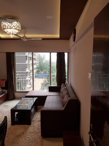 Living Room in 2 BHK Apartment at Dharti Pressidio, Kandivali West – for Rent