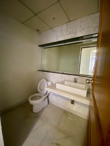 Bathroom in 4 BHK Apartment at Boat Club Road – for Sale