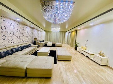 Living Room in 4 BHK Apartment at Boat Club Road – for Sale
