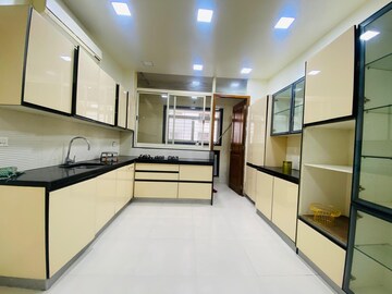 Kitchen in 4 BHK Apartment at Boat Club Road – for Sale