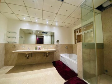 Bathroom in 4 BHK Apartment at Boat Club Road – for Sale