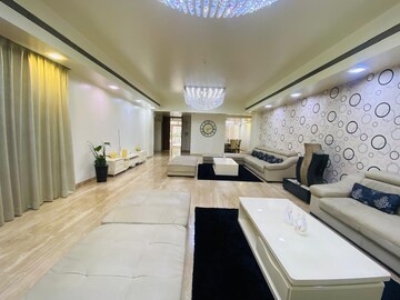 Living Room in 4 BHK Apartment at Boat Club Road – for Sale