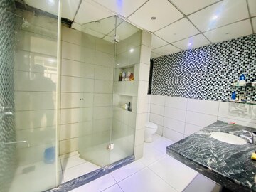 Bathroom in 4 BHK Apartment at Boat Club Road – for Sale