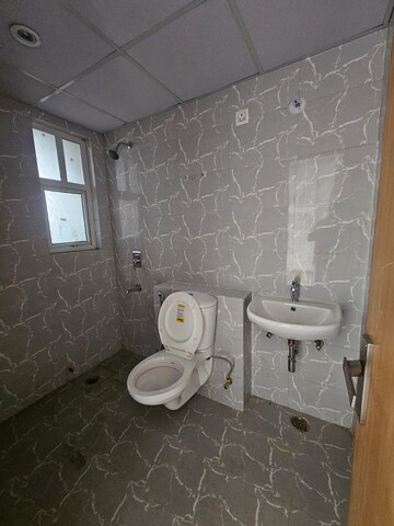 Bathroom in 2 BHK Apartment at Parker White Lily, Sector 8 – for Rent
