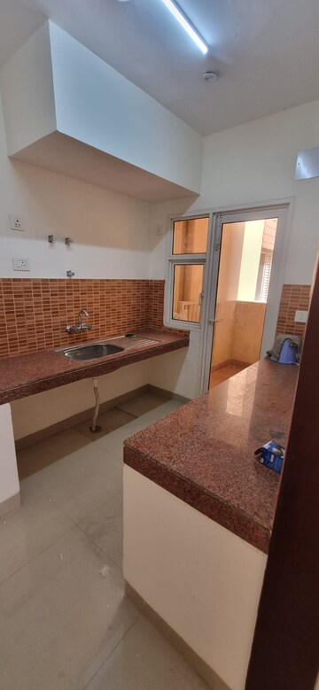 Kitchen in 2 BHK Apartment at Eldeco Accolade, Sohna Sector 2 – for Rent