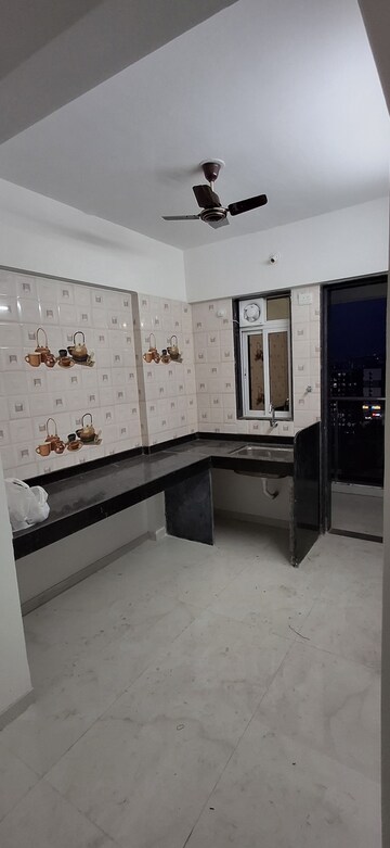 Kitchen in 2.5 BHK Apartment at Somani Dream Home, Punawale – for Rent