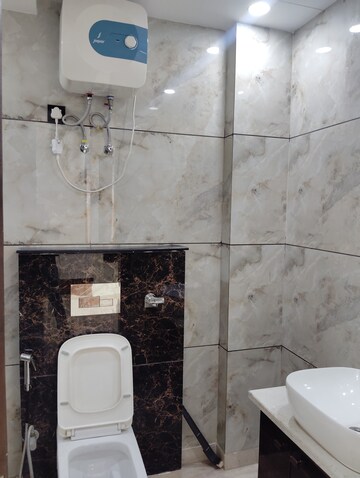 Bathroom in 3 BHK Apartment at Jahaz Apartments, Paschim Vihar – for Rent