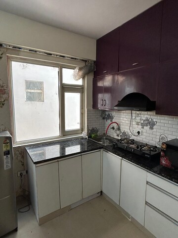 Kitchen in 3 BHK Apartment at Emaar Gurgaon Greens, Sector 102 – for Sale