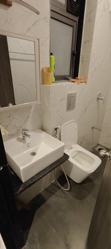 Bathroom in 2 BHK Apartment at Dev Leo Tower, Oshiwara – for Rent
