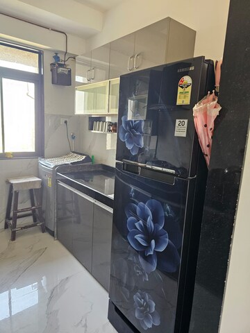 Kitchen in 2 BHK Apartment at Dev Leo Tower, Oshiwara – for Rent
