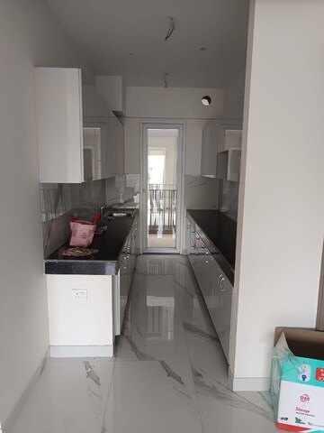 Kitchen in 2 BHK Apartment at Smart World Gems, Sector 89 – for Sale
