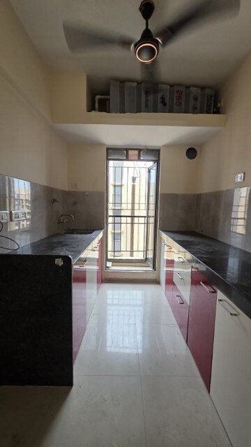 Kitchen in 2 BHK Apartment at Rustomjee Avenue L1, Virar West – for Rent