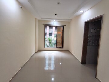 Living Room in 1 BHK Apartment at KD Niraj Exotica, Khadakpada – for Rent