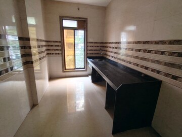 Kitchen in 1 BHK Apartment at KD Niraj Exotica, Khadakpada – for Rent