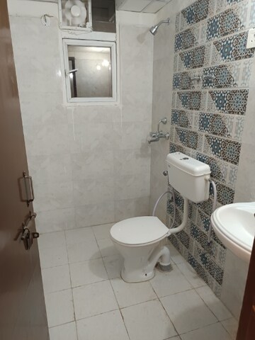 Bathroom in 2 BHK Apartment at Signature Global Proxima, Sector 89 – for Rent