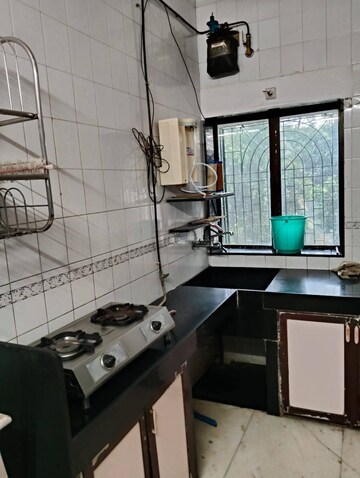 Kitchen in 2 BHK Apartment at Ashish CHS Vile Parle West, Vile Parle West – for Rent