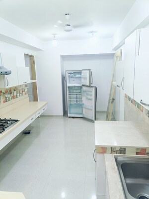 Kitchen in 4 BHK Apartment at Rustomjee 7 JVPD, Juhu – for Sale