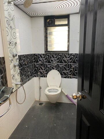 Bathroom in 1 BHK Apartment at Raunak Bliss B1, Ghodbunder Road – for Rent
