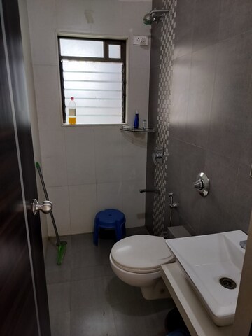 Bathroom in 1 BHK Apartment at Raunak Bliss, Ghodbunder Road – for Rent