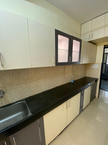 Kitchen in 1 BHK Apartment at KIPL Morya, Kasarvadavali – for Rent